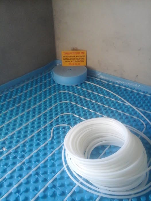 Travaux de chauffage par le sol